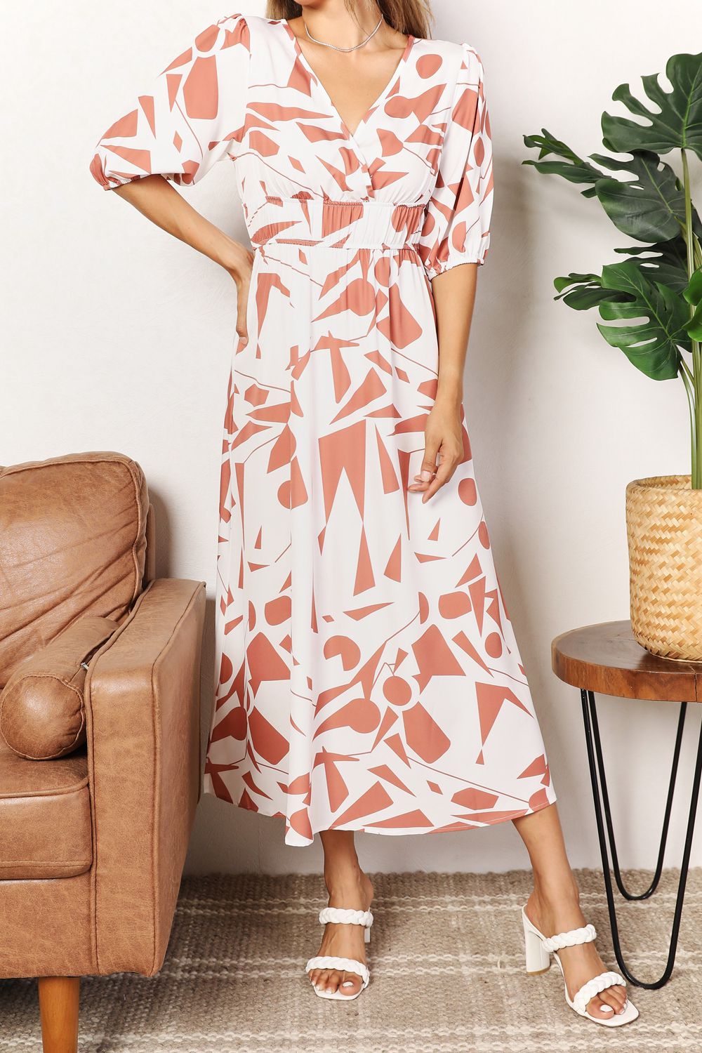 Vestido estampado con mangas globo y sobrepelliz