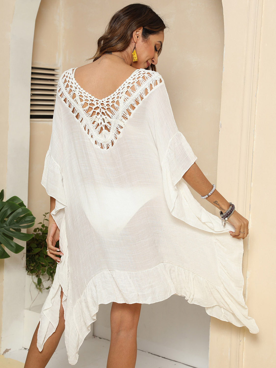Vestido playero de media manga con volantes y aberturas