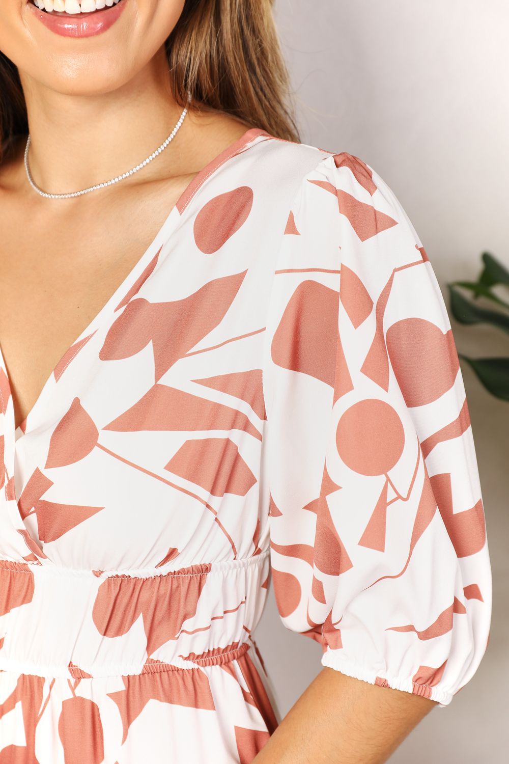 Vestido estampado con mangas globo y sobrepelliz