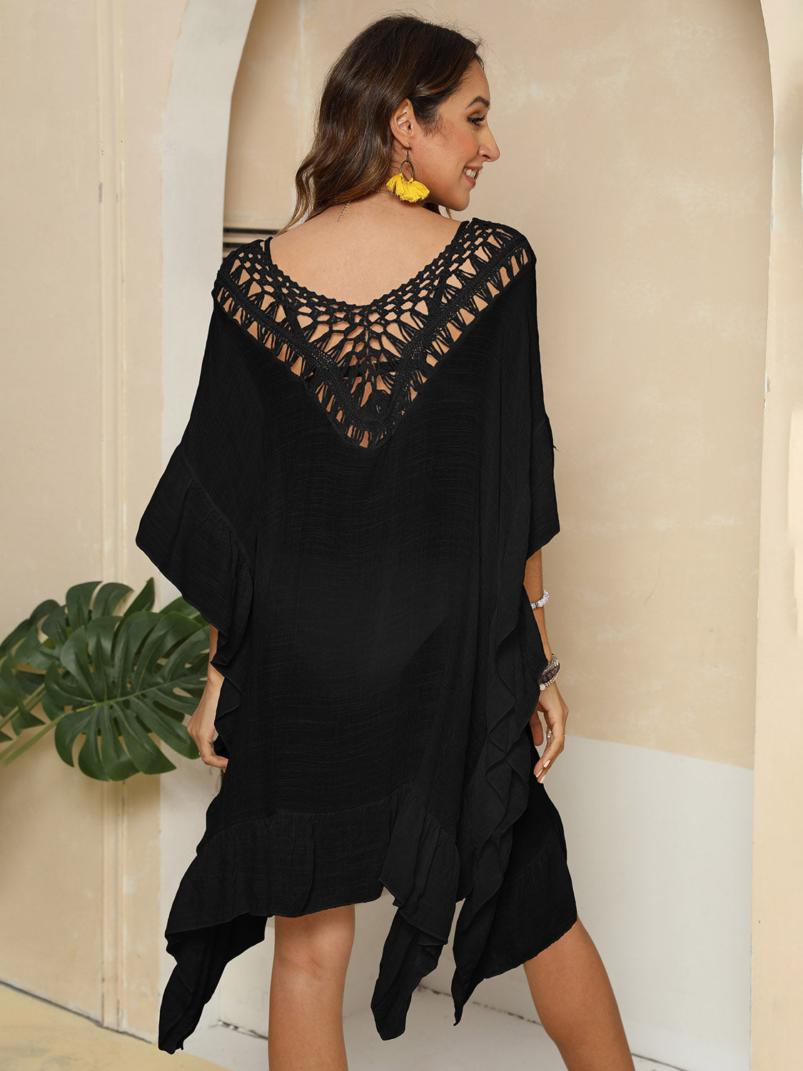 Vestido playero de media manga con volantes y aberturas