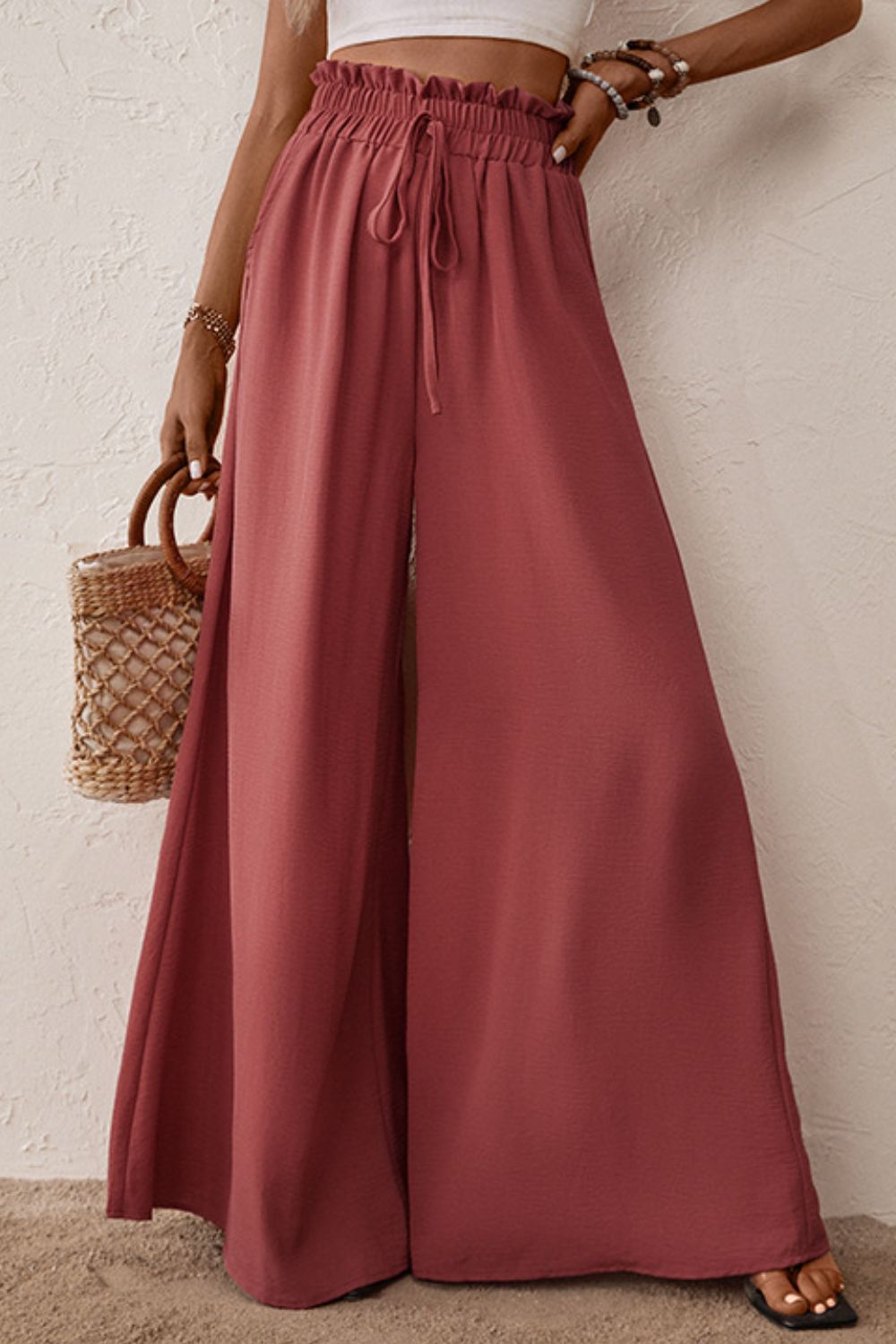 Pantalones anchos con cintura paperbag y fruncido