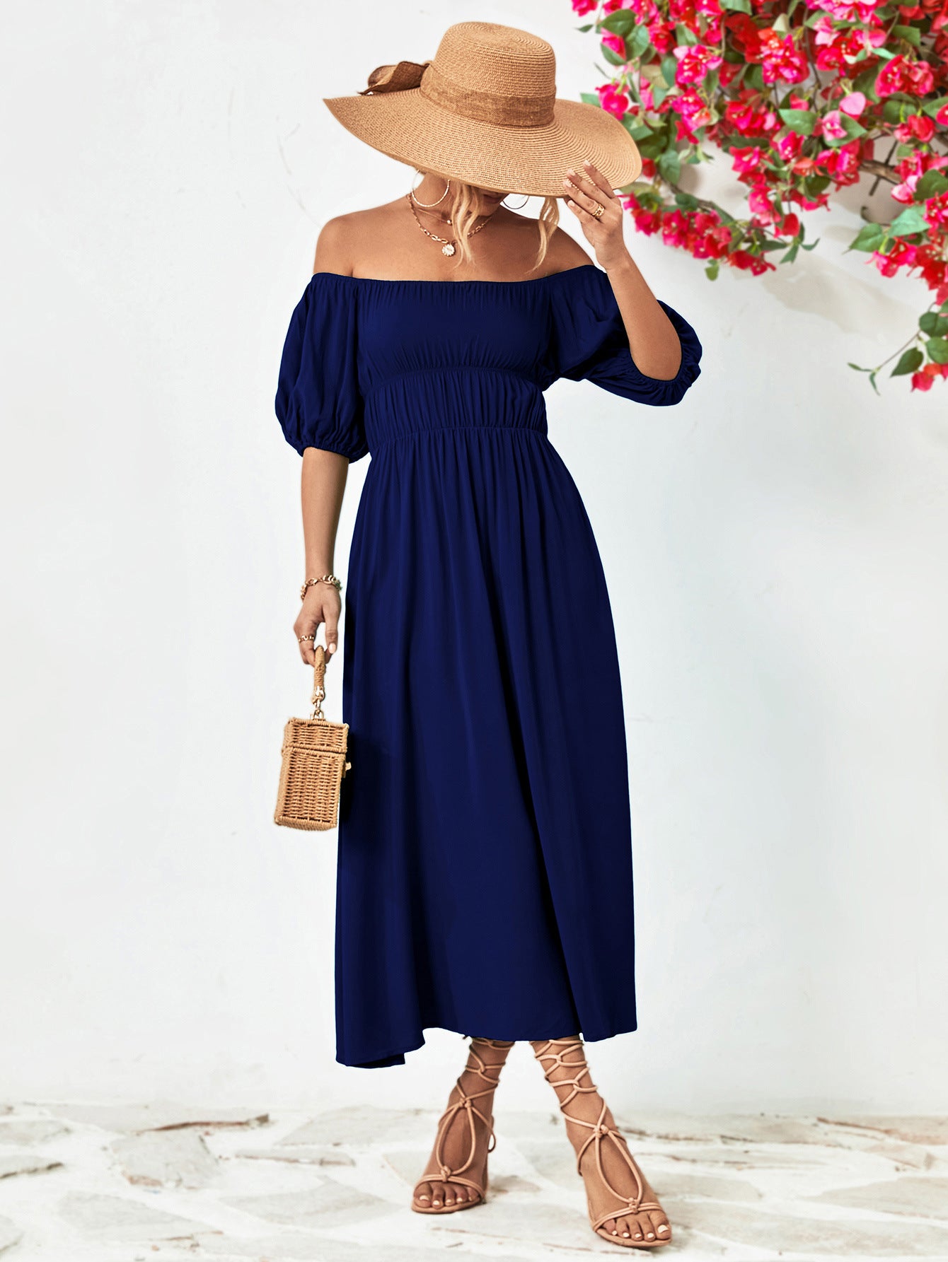 Vestido midi con mangas globo y hombros descubiertos