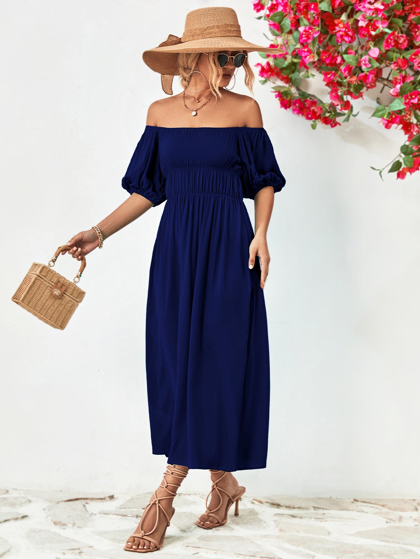 Vestido midi con mangas globo y hombros descubiertos