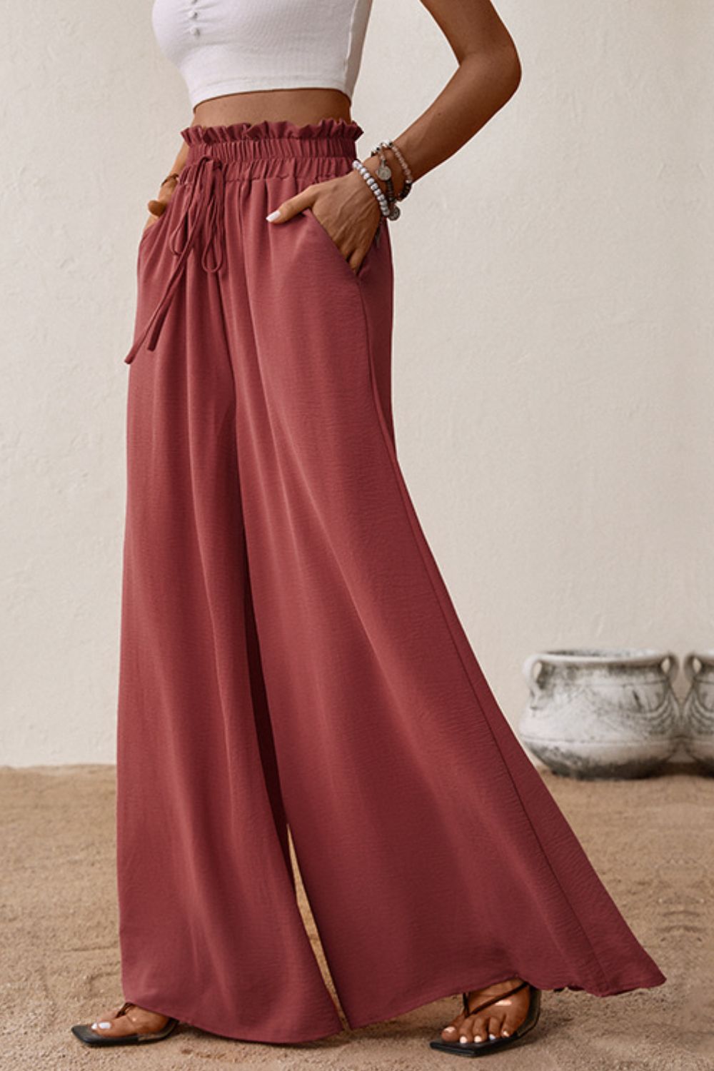 Pantalones anchos con cintura paperbag y fruncido