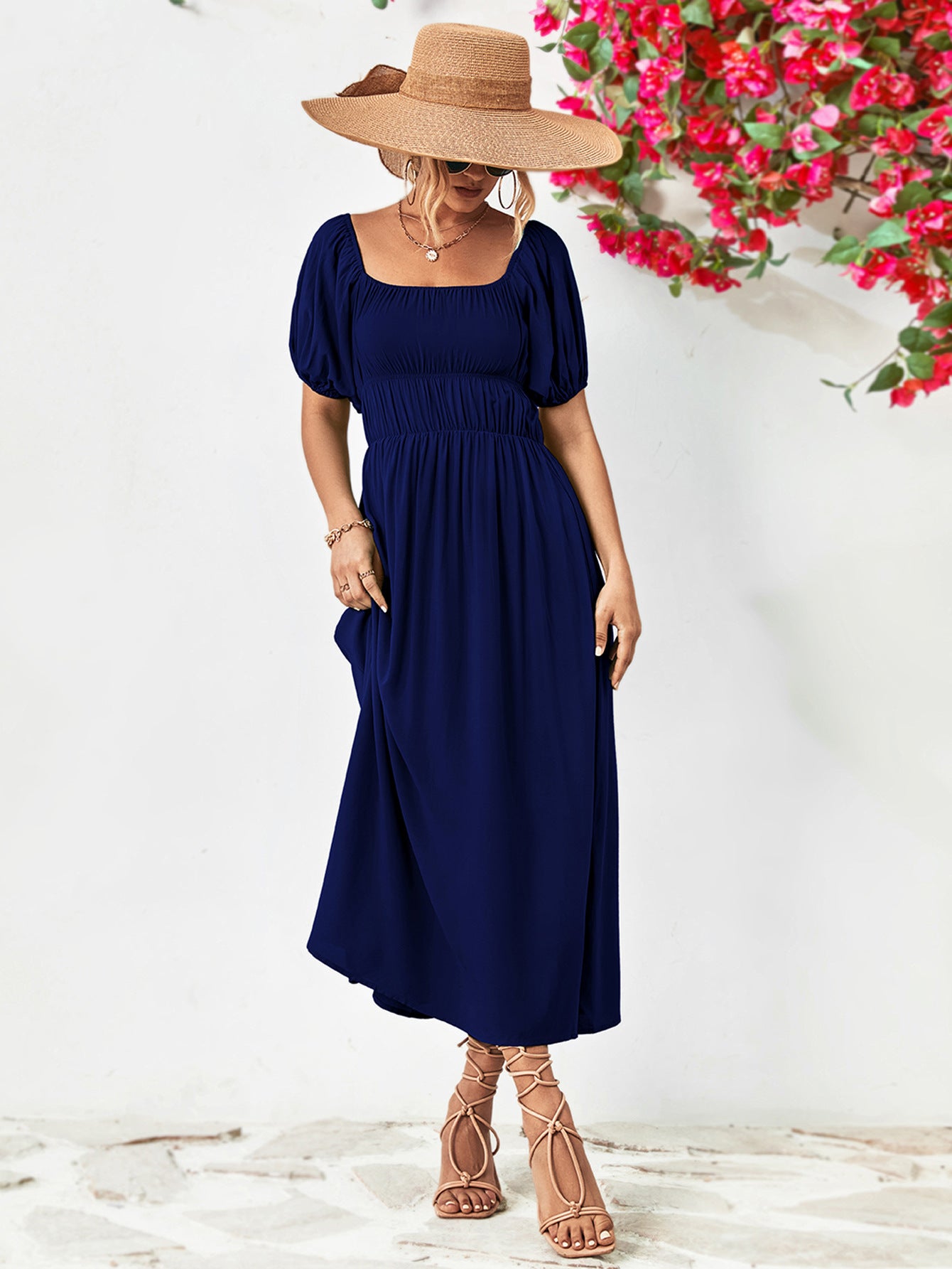 Vestido midi con mangas globo y hombros descubiertos
