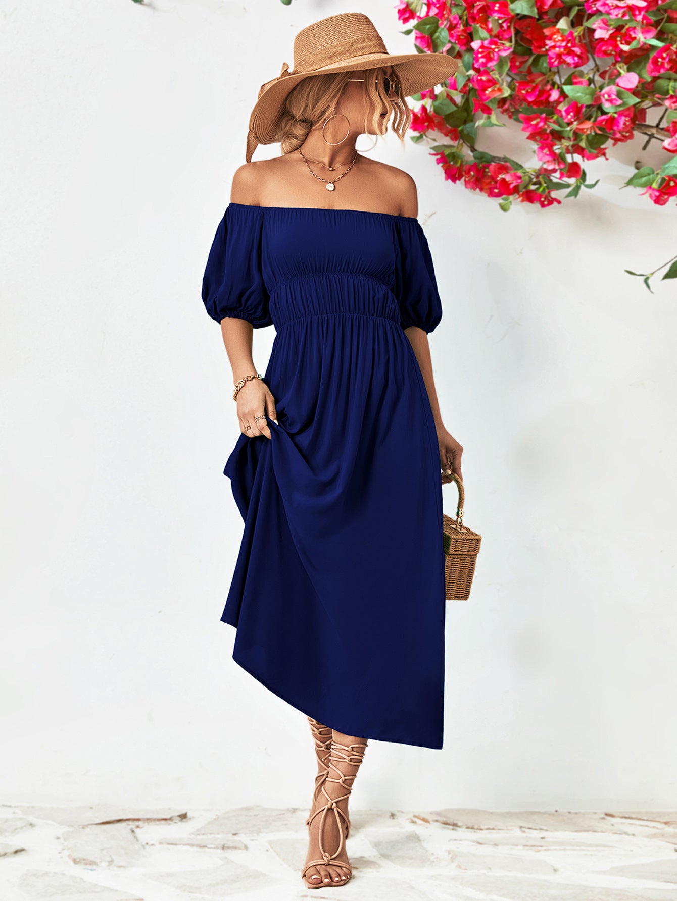 Vestido midi con mangas globo y hombros descubiertos