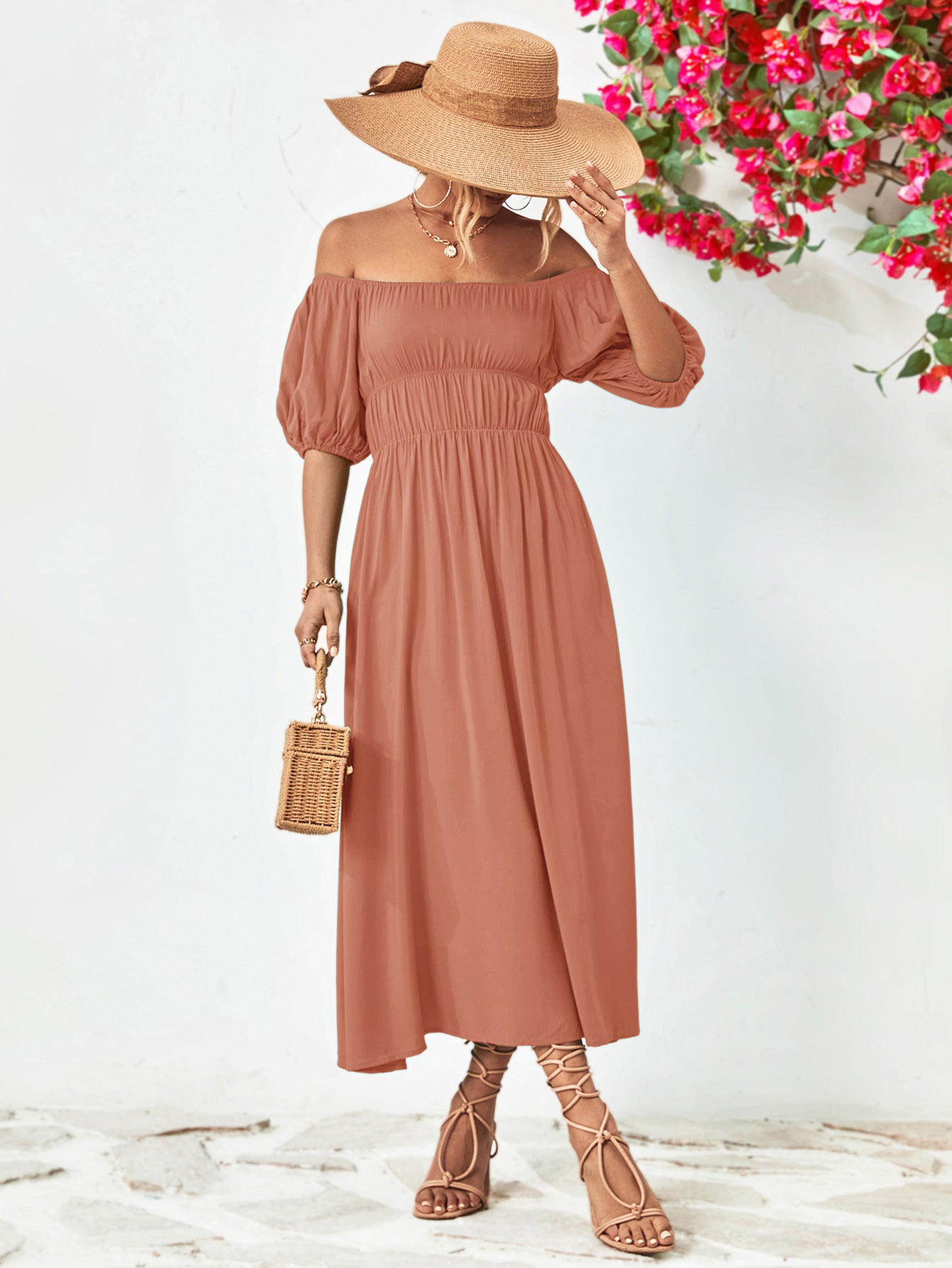 Vestido midi con mangas globo y hombros descubiertos