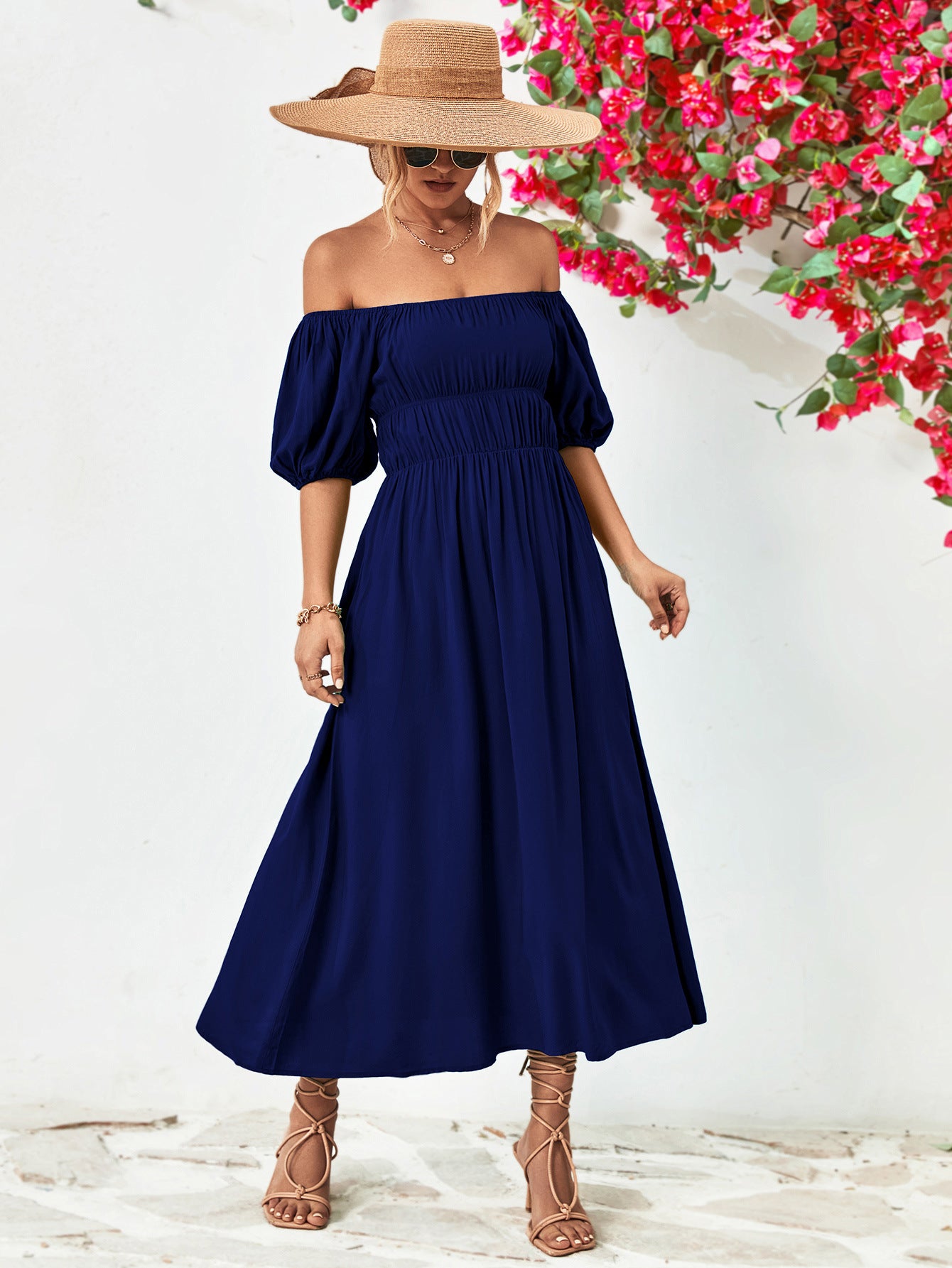 Vestido midi con mangas globo y hombros descubiertos